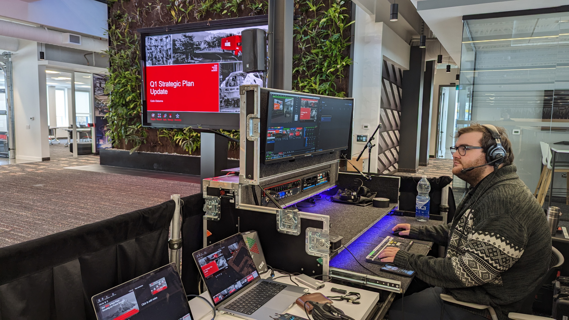 A streaming rig and technician at a webinar