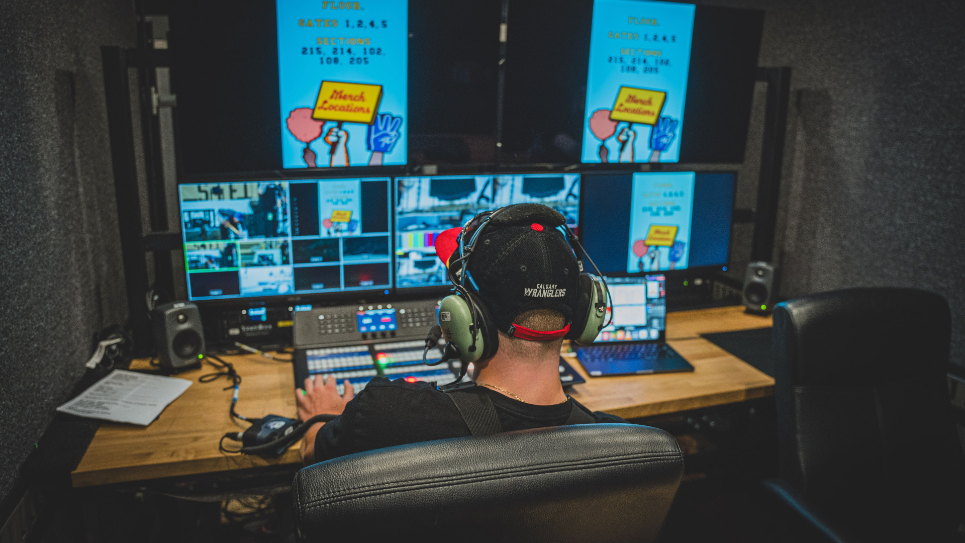 A video technician cuts live video for Arkells' Rally